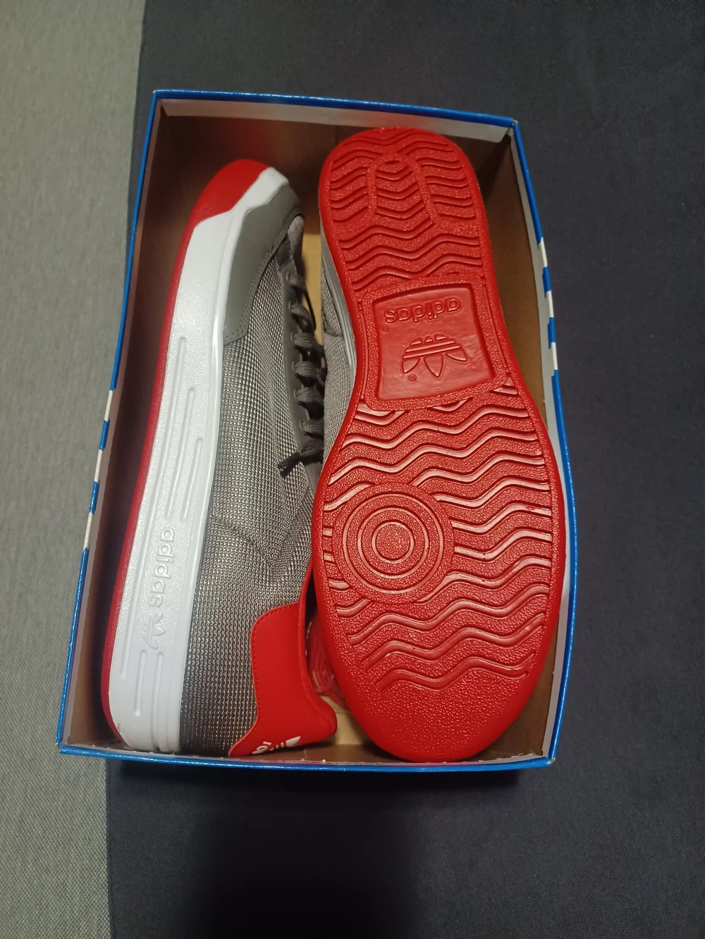 Adidas Men’s Rod Laver Grey Low-Top Sneaker with Red Accents